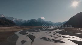 Girls play football near Mount Cook to mark one month to FIFA Women's World Cup