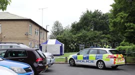 Woman and teenage boy arrested on suspicion of murder after a man's body was found at a flat