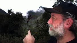 Sword-billed Hummingbird Lands on Man's Finger