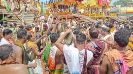 One million Hindu devotees drenched in colour as they celebrate Puri's Ratha Yatra chariot festival