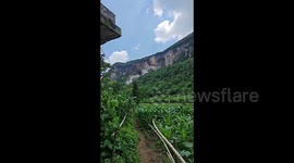 Massive landslide strikes mountain in southern China
