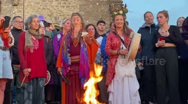 Summer solstice: Dozens of revellers gather at Glastonbury Tor, England