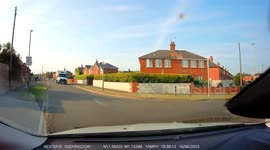Car in near-miss with child on scooter