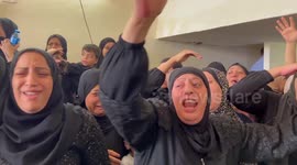 Palestinians carry the body of Mohammad Hashash during his funeral at Balata camp in the West Bank city of Nablus