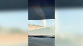 Dust devil tornado spotted tearing along roadside in UAE