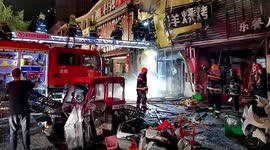 Flames and smoke billow from restaurant after explosion kills 31 people in northwest China