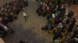 Mourners attend the funeral of the Palestinian Omar Qateen, 27, who was killed by Israeli bullets during Israeli settlers raid, in Turmus Aya, near the West Bank city of Ramallah