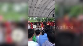Determined marching band continues performance through flood