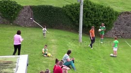Cheeky toddler runs away with CORNER FLAG causing hilarious delay to soccer match in Dublin