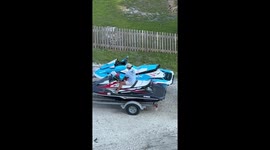 Guys Use Lawn Mower to Launch Jet Skis