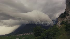 Spectacular clouds and strong winds sweep Swiss Alps