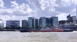 The HMS Belfast Seen Moored On The River Thames