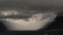 4K - Stormchaser gets exited over strong winds and jawdropping clouds in swiss Alps