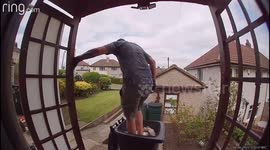 Painful mishap! Man breaks wrist while flattening cardboard inside bin