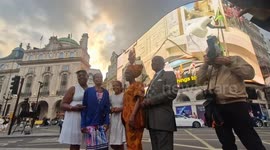 Heartwarming moment as West Indian community gather to watch film commissioned for Windrush Day on iconic Piccadilly Circus screen