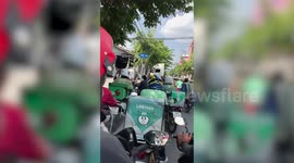 Bungling truck driver causes traffic jam after getting stuck on street while making turn