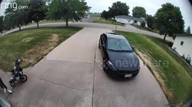 Stroller Rolls Down Driveway