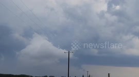 Rotating Supercell Storm Tracks Across Highway in Alberta, Canada