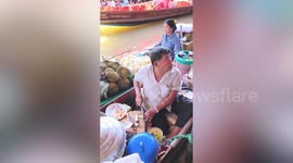 Fast-handed vendor chops vegetables like machine without looking at them