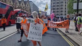 Just Stop Oil activists slow march against jailed activist Marcus Decker's deportation