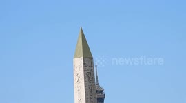 Paris: New Obelisk's golden tip. (Better version, stable video, different views that the last video). After centuries, the Concorde obelisk regains its golden tip. The famous Parisian monument, offered by Egypt to France, had already lost its top, eroded