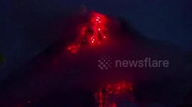Glowing lava spills from Mayon Volcano amid heightened unrest in the Philippines