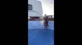Man slips when wife splashes him with water during swimming pool cleaning