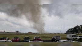 Huge tornado rips through suburban areas in Indiana sending debris into the air