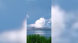 Philippines' Taal Volcano vents large white smoke plume from crater