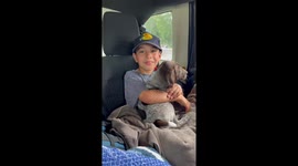 Boy Doesn't Hold Back His Love for New Puppy
