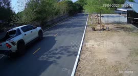 Pickup truck slides down street after driver forgets to use handbrake