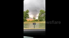 US driver reacts to deadly tornado forming in Indiana