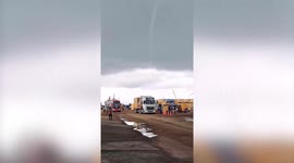 Waterspout tornado terrifies fishermen as it swirls off coastal town in the Philippines