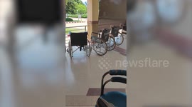Spooky moment wheelchair 'ghost' rolls backwards with nobody nearby
