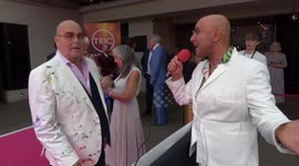 James Whale arrives at the Tric Awards in London talking about his life achievement award