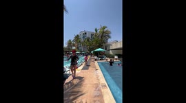 Girl Slips and Falls on the Way to the Pool