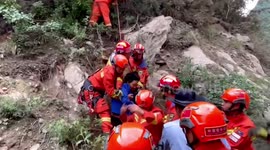 Four found dead after mudslides and floods hit southern China
