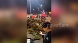 Trafficker transporting tonne of marijuana overturns in front of POLICE in Juiz de Fora, Brazil