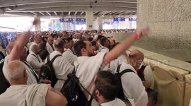 Hajj pilgrimage: Muslim worshippers throw pebbles at pillars in Mina, Saudi Arabia