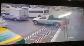 Speeding motorcyclist clotheslined on level crossing barrier in Thailand