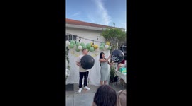 Parents-to-be redefine cuteness goals with their contagious excitement during twins' gender reveal