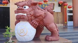 Adorable one year old girl terrified of Chinese Animal Statue