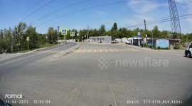 A woman is very lucky at a pedestrian crossing in Omsk, Russia