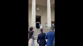 Wedding Couple Celebrate With Water Blasters