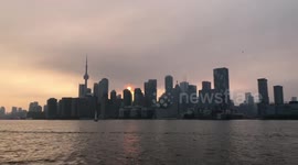 Toronto City Skyline Sunset on Smoke filled day Ontario Canada