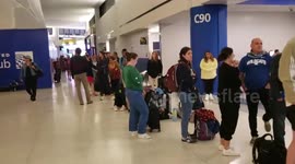 Extremely long queues at the Newark Liberty International Airport due to severe weather