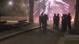 Angry demonstrators throw fireworks at French police