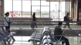 File footage of travelator: Airport horror as passenger's leg is ripped apart by automatic walkway in Bangkok