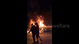 Hooded men storm Nanterre starting fires and hurling objects at police