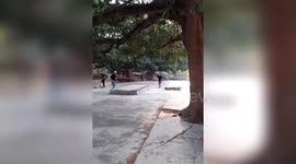 Skateboard hits guy's bottom when he bails on ramp jump